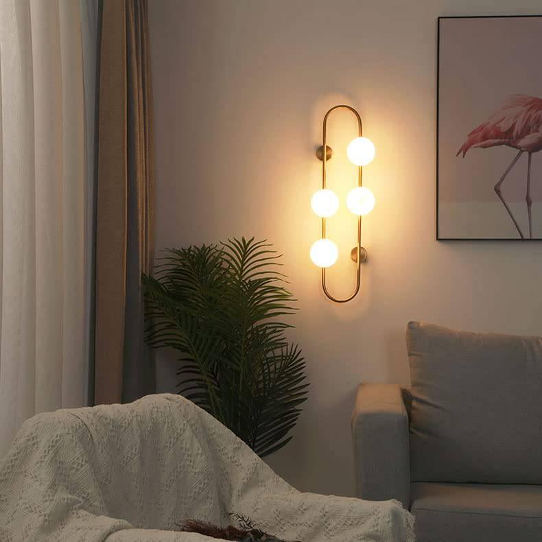 4 Light Gold Frosted Glass Ball Wall Light